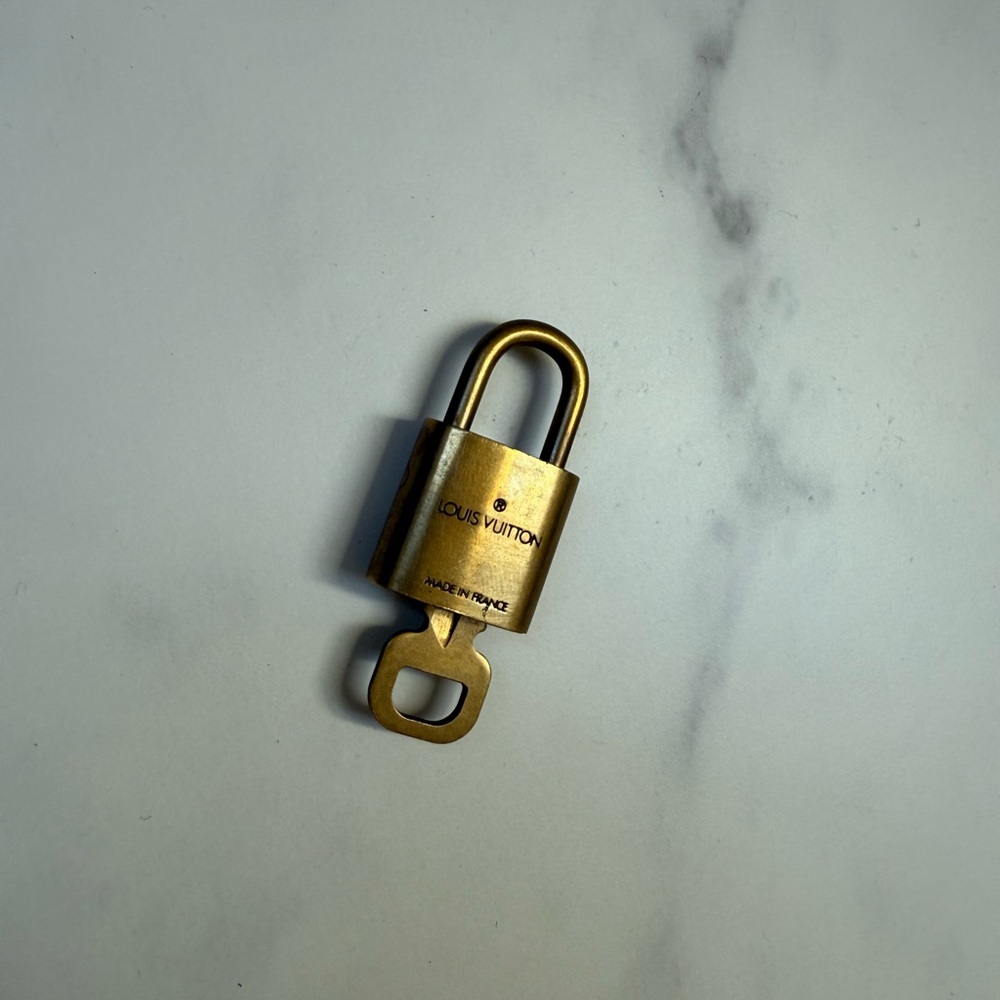 Louis Vuitton Gold Lock #308